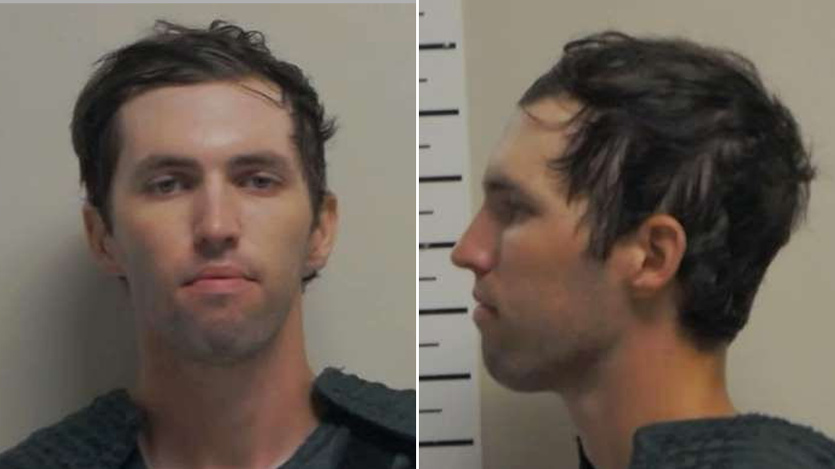 Tyler Robinson in a few Mugshot photos showing his portrait and profile. He has brown hair, hazel eyes and a pure shave