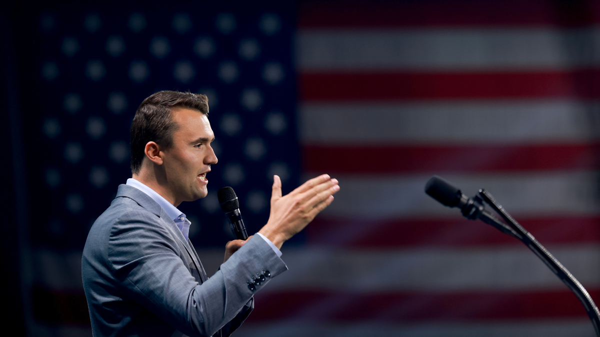 Charlie Kirk speaks under a turning point US conference
